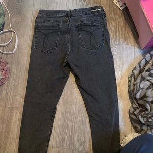 Black Calvin Klein jeans